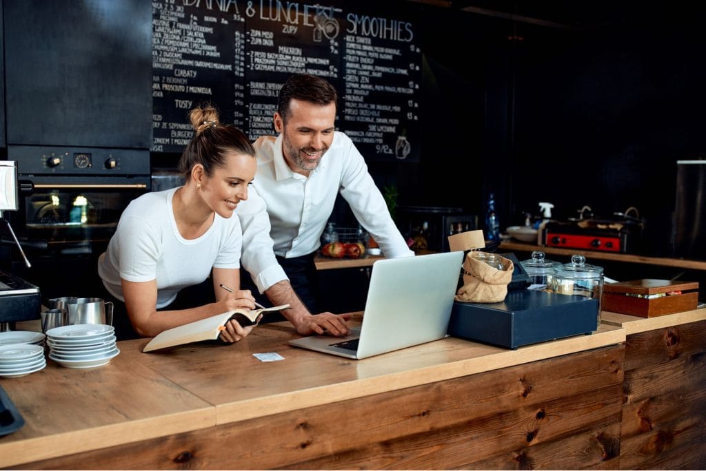 small business owners doing accounting and bookkeeping