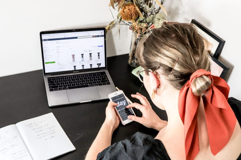An eCommerce seller adds items to her online store.